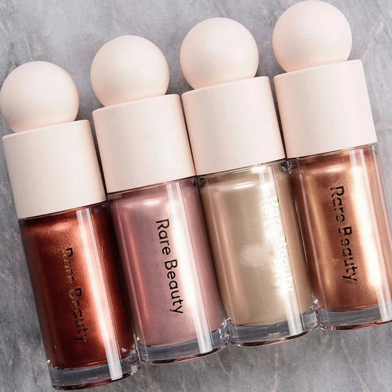 BRONZER E ILUMINADOR LÍQUIDO RARE BEAUTY